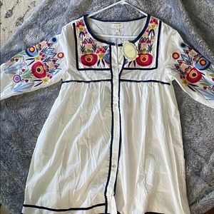 Tunic top. Can be worn as a beach cover up.